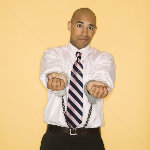 Man in handcuffs. Stock photo © iofoto