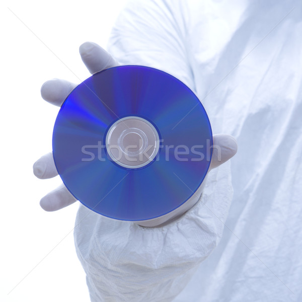 Biohazard man holding disc. Stock photo © iofoto