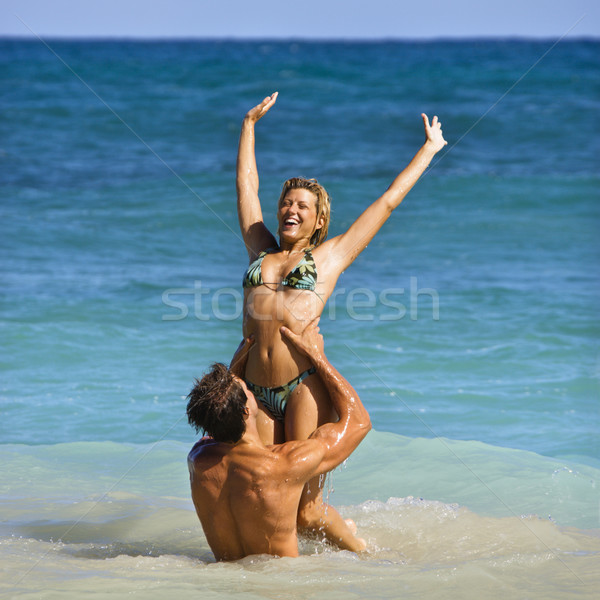Smiling playful couple. Stock photo © iofoto