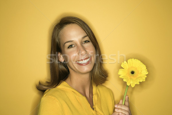 Pretty woman smiling. Stock photo © iofoto