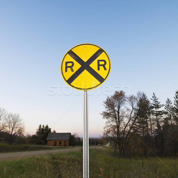 Railroad crossing sign. Stock photo © iofoto