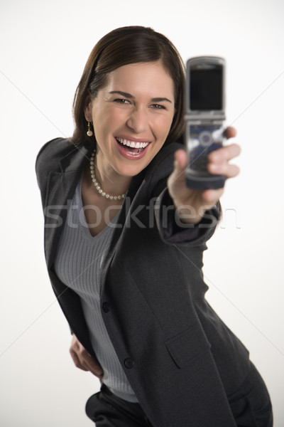 Woman and cell phone. Stock photo © iofoto
