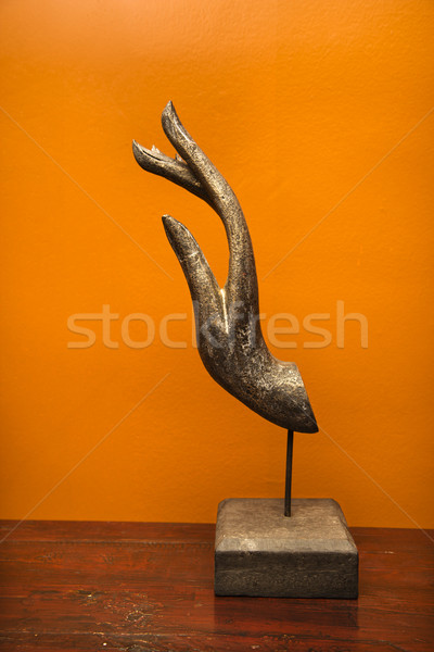 Carved wooden hand. Stock photo © iofoto