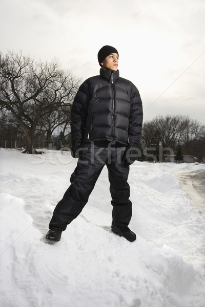 Boy standing in snow. Stock photo © iofoto
