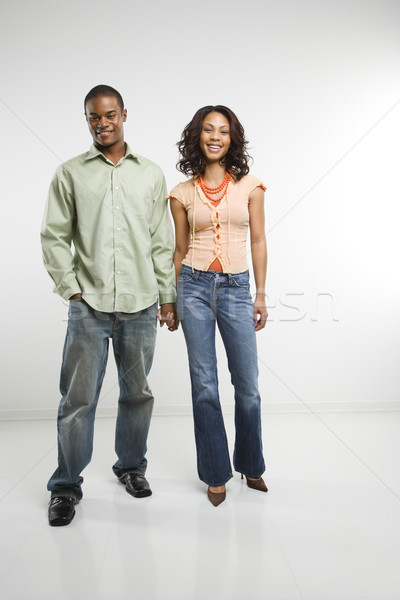 Couple holding hands. Stock photo © iofoto