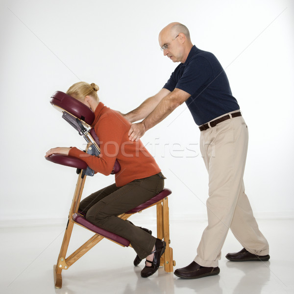 Man massaging woman. Stock photo © iofoto