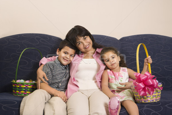семьи Пасху сидят диване улыбаясь Сток-фото © iofoto