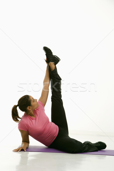 Nő nyújtás felnőtt több nemzetiségű visel testmozgás Stock fotó © iofoto