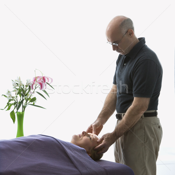 Man massaging woman. Stock photo © iofoto