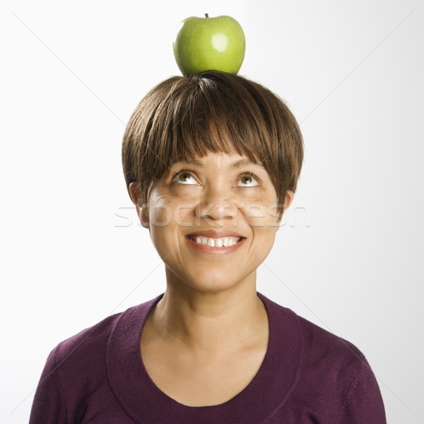 Apple on head. Stock photo © iofoto