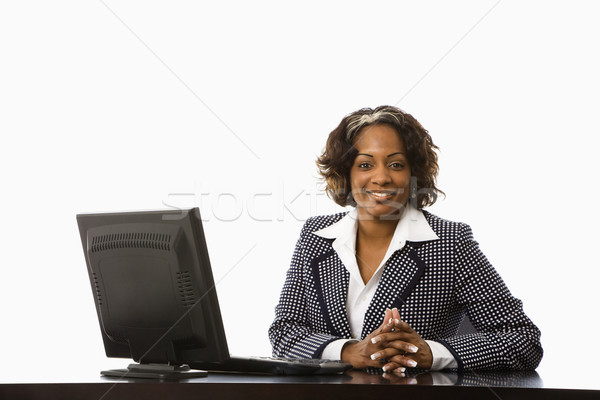 Femme d'affaires bureau séance bureau ordinateur souriant [[stock_photo]] © iofoto