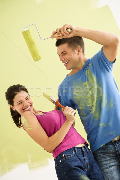 Stock photo: Playful fun couple.