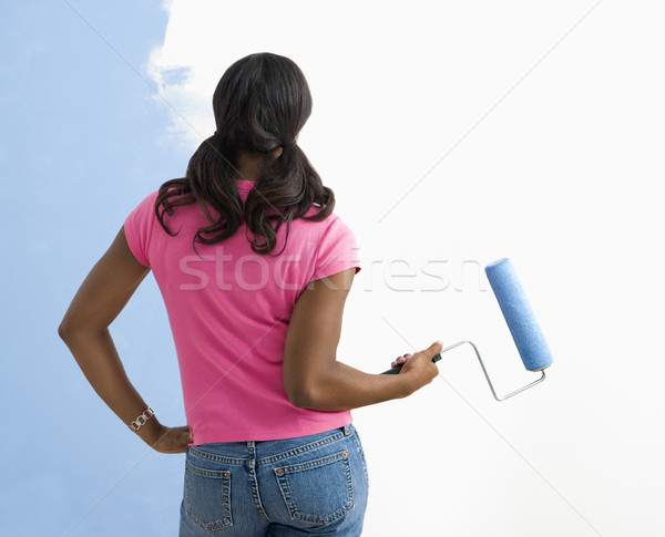 Woman observing paint job. Stock photo © iofoto