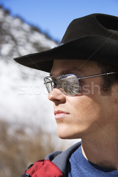 Férfi visel cowboykalap kaukázusi férfi napszemüveg Stock fotó © iofoto