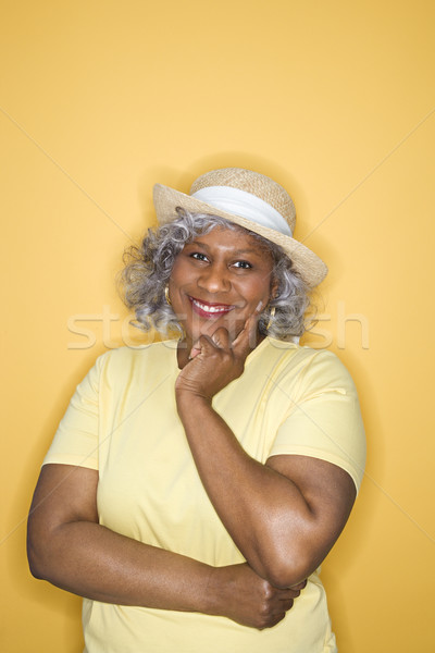 Nő néz mosolyog afroamerikai női középkorú felnőtt Stock fotó © iofoto