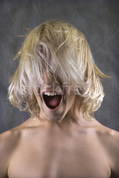 Teen boy screaming. Stock photo © iofoto