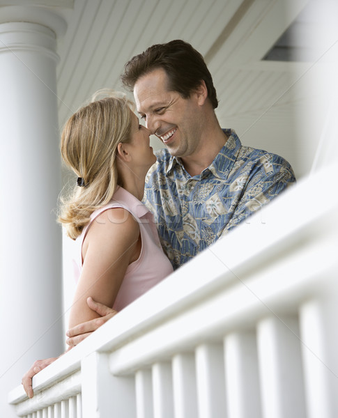 Boldog pár veranda otthon szeretetteljes arc Stock fotó © iofoto