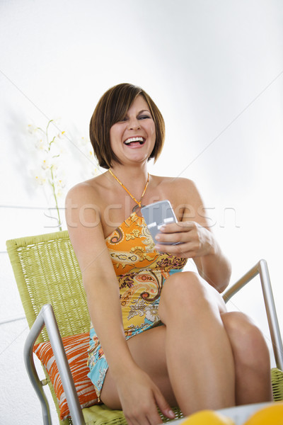 Nő pda kaukázusi felnőtt barna hajú tart Stock fotó © iofoto