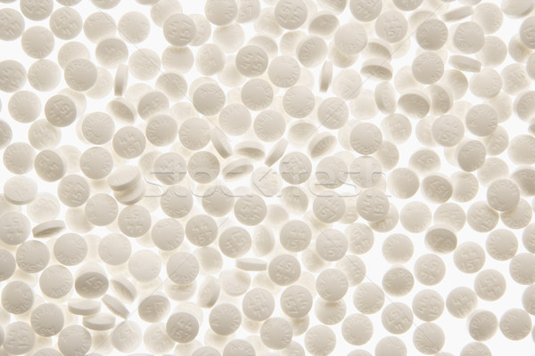 Stock photo: Round White Pills. Isolated