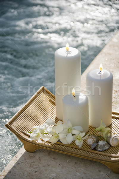 Candles by pool. Stock photo © iofoto