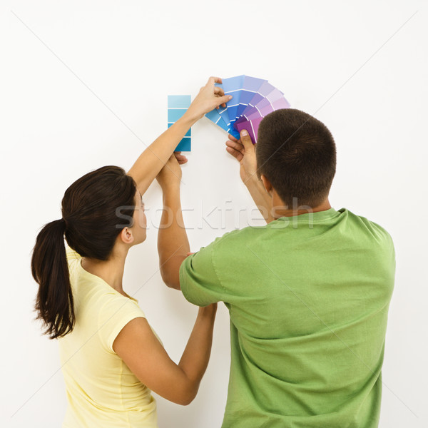 Stock photo: Couple choosing home color.