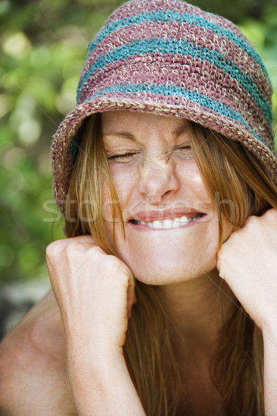 Woman making face. Stock photo © iofoto