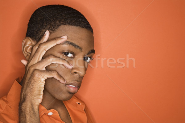 Stock foto: Porträt · Mann · jungen · Hand · Gesicht · orange