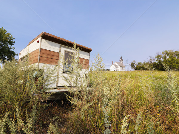 Camper and church in field. Stock photo © iofoto