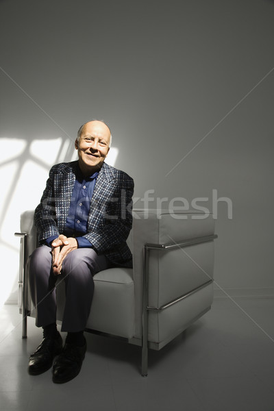 Férfi ül szék kaukázusi középkorú felnőtt férfi Stock fotó © iofoto