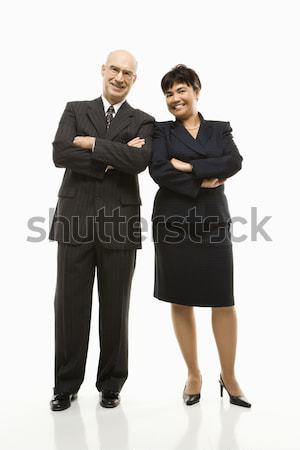 Smiling businessman and woman. Stock photo © iofoto
