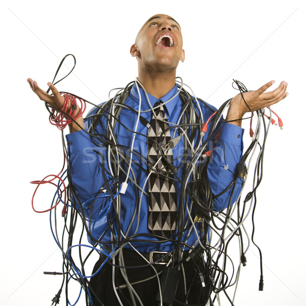 12854_stock-photo-man-wrapped-in-cables.