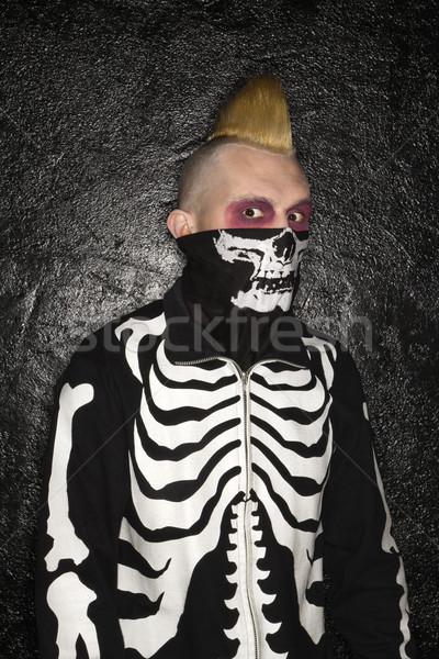 Punk with skeleton costume. Stock photo © iofoto