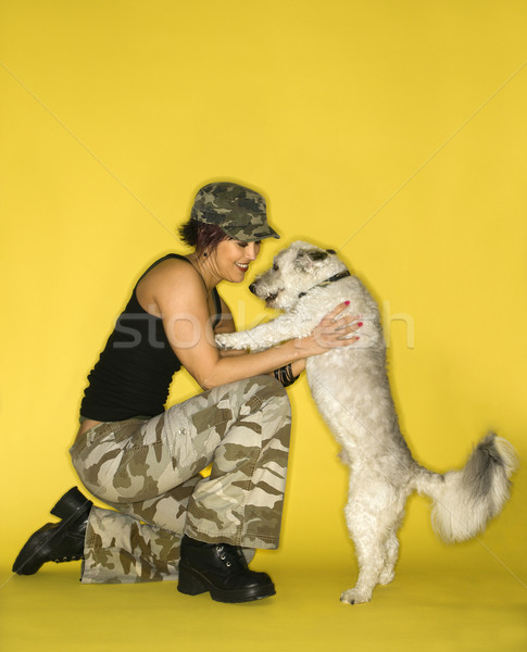 Young woman with dog. Stock photo © iofoto