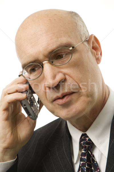 Businessman on cellphone. Stock photo © iofoto