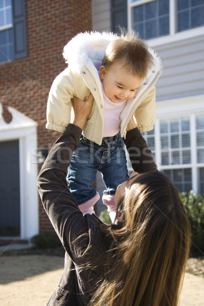 Anya gyermek kaukázusi magasra tart kislány ház Stock fotó © iofoto