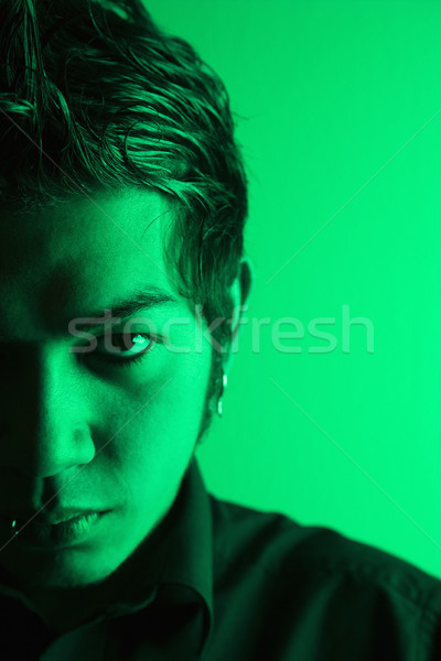 Attractive young man portrait. Stock photo © iofoto