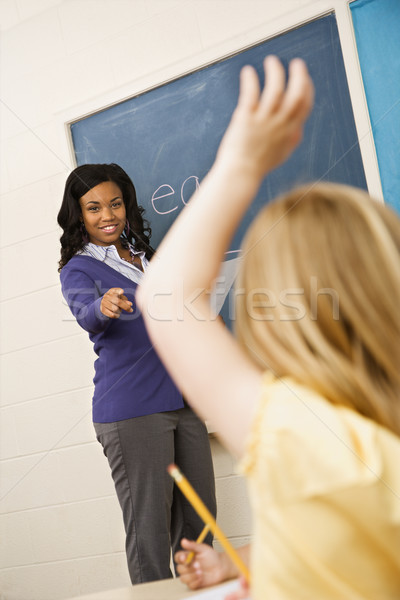 Leraar roepen student glimlachend wijzend hand Stockfoto © iofoto