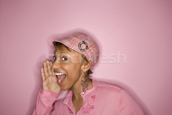 Woman yelling and smiling. Stock photo © iofoto