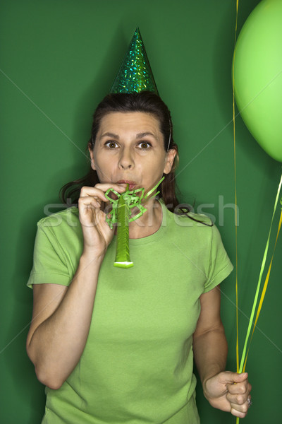 Woman wearing party hat. Stock photo © iofoto