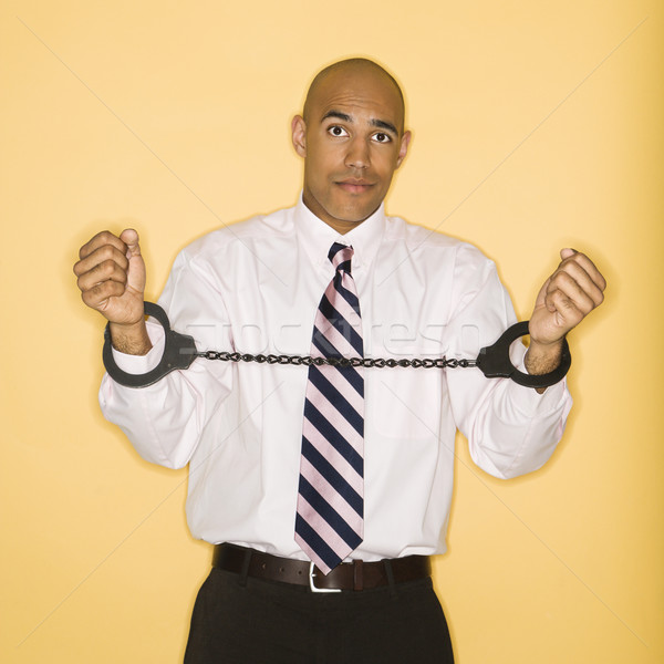 Man in handcuffs. Stock photo © iofoto