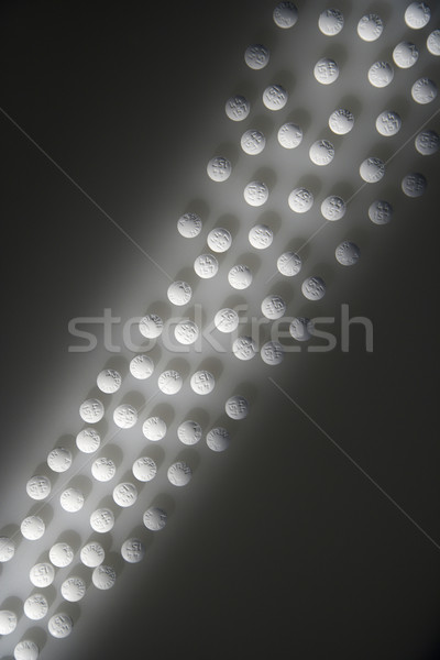 Lined Up White Pills Stock photo © iofoto