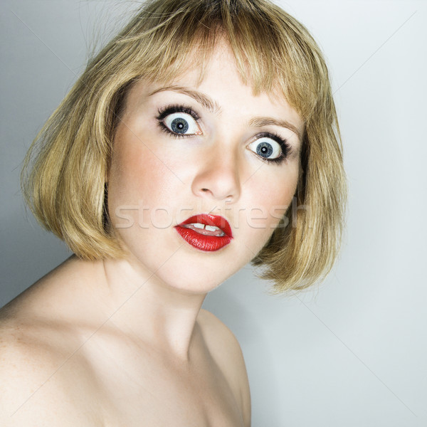 Woman looking confused. Stock photo © iofoto