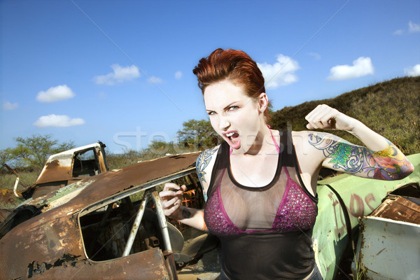 Sexy tatuato donna arrabbiato Foto d'archivio © iofoto