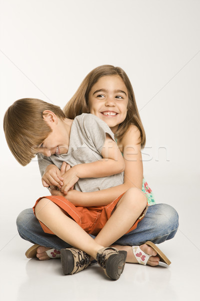 Brat siostra chłopca posiedzenia dziewcząt uśmiechnięty Zdjęcia stock © iofoto
