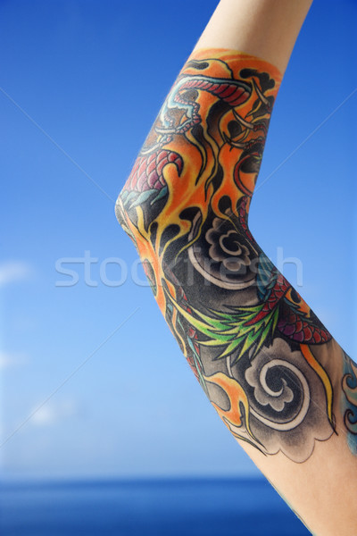 Kol dövmeli kadın okyanus Hawaii Stok fotoğraf © iofoto