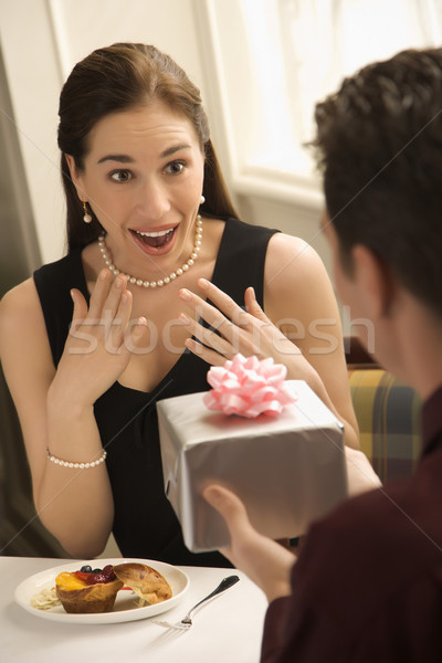 Man giving woman gift. Stock photo © iofoto