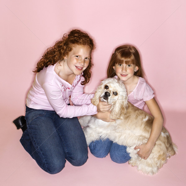 Mädchen halten Hund weiblichen Kinder Stock foto © iofoto