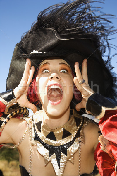 Woman making facial expression. Stock photo © iofoto