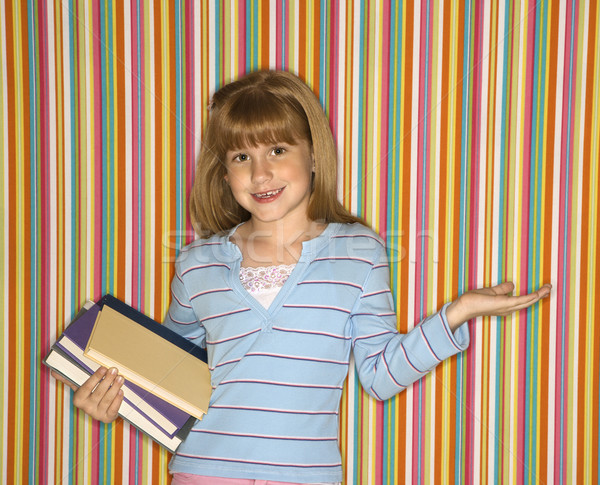 Girl holding books. Stock photo © iofoto