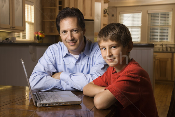 Man and Young Boy with Laptop Stock photo © iofoto